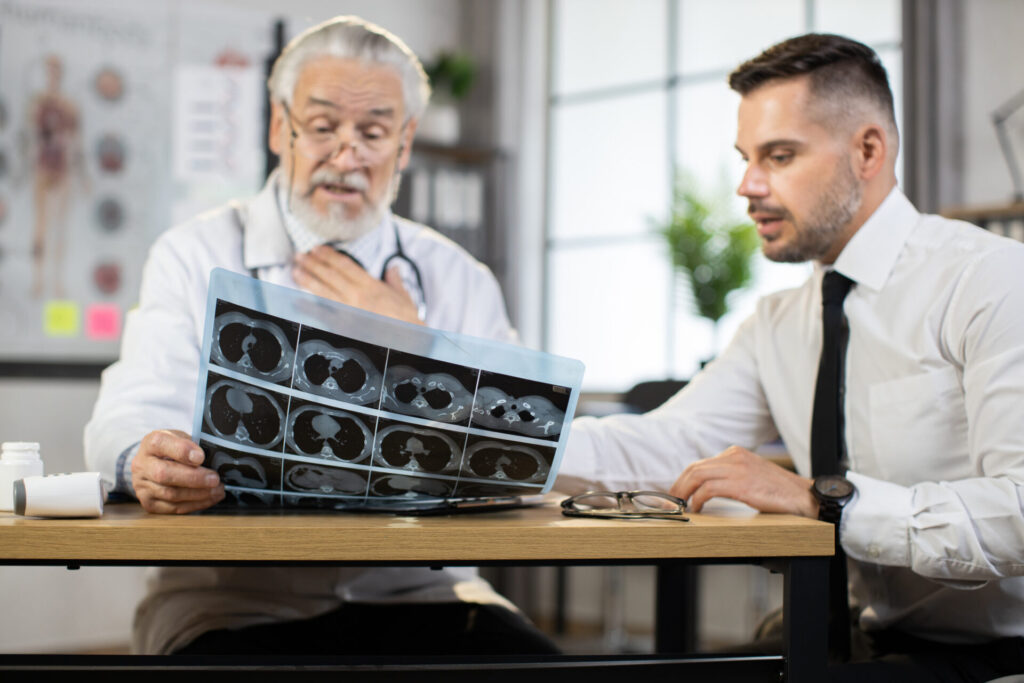 A personal injury doctor with a patient